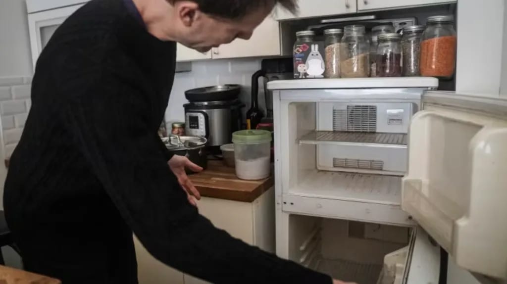 a picture of visual inspection of a fridge